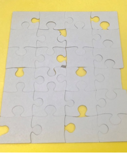  This puzzle has been modified using a sharp blade to remove pieces such as tabs and edges. Here one can see how contours that might normally appear to go together do not seem to. The usual cues are gone. Normally done as a face-up puzzle to make it easier, expect this activity to frustrate some learners as it defies expectations they have set. To elevate the cognitive load, use a non-rectangular puzzle, such as an oval, a bow tie shape, etc.
