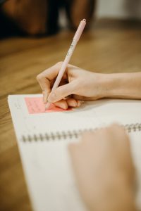 Person writing notes